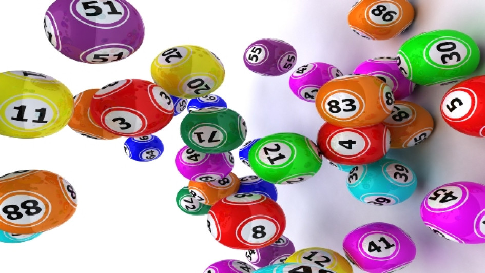 resultados-loteria-de-manizales-1-marzo-2023 Bolas de bingo de muchos colores cayendo.