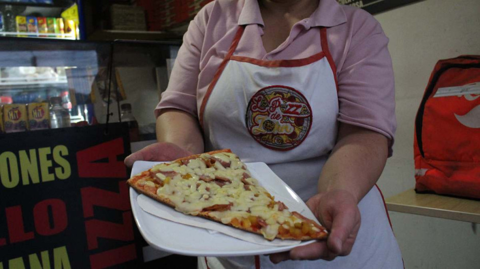Pizza de Jhon, en San Jorge. Prepárese para estirar el queso de las mejores pizzas de la ciudad