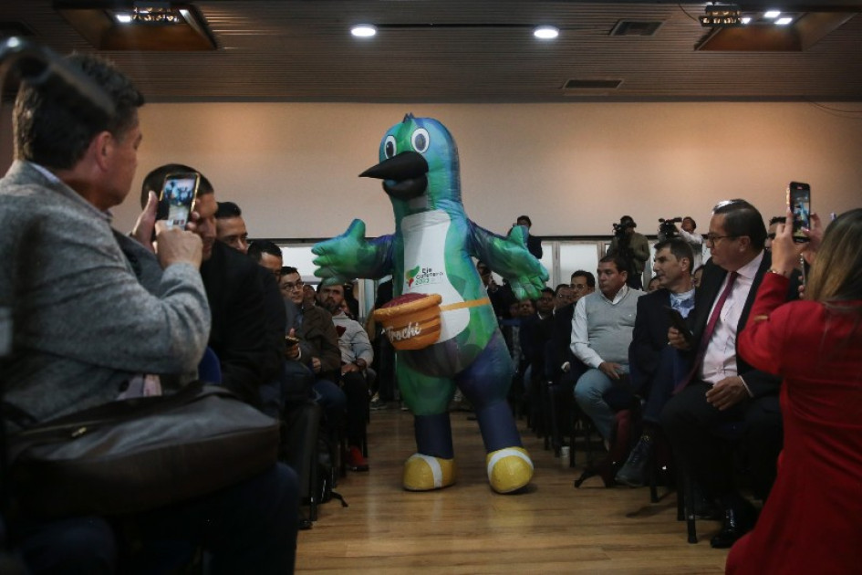 Los XXII Juegos Deportivos Nacionales y VI Paranacionales fueron ratificados y presentados ayer en Bogotá para el Eje Cafetero. Trochi, la mascota de las justas, abrió la programación. Los XXII Juegos Deportivos Nacionales y VI Paranacionales fueron ratificados y presentados ayer en Bogotá para el Eje Cafetero. Trochi, la mascota de las justas, abrió la programación.