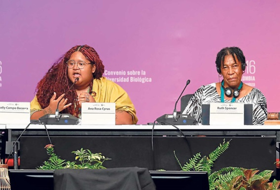 Ana Rosa Cyrus, directora ejecutiva de la Asociación Juvenil Engajamundo, habla junto a Ruth Spencer, presidenta del Marine Ecosystem Protected Areas Trust de Antigua y Barbuda, durante la COP16 en Cali. Ana Rosa Cyrus, directora ejecutiva de la Asociación Juvenil Engajamundo, habla junto a Ruth Spencer, presidenta del Marine Ecosystem Protected Areas Trust de Antigua y Barbuda, durante la COP16 en Cali.